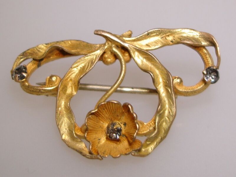 Antique Art Nouveau gold washed floral pin with diamonds