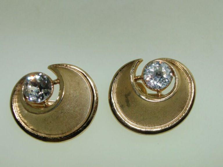 Vintage Trifari gold tone swirl clip-on earrings with CZ