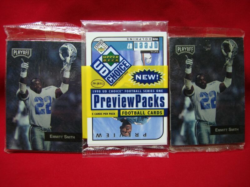 Vintage unopened football card packs from 1993 Playoff Promo and 1998 Upper Deck Choice Preview