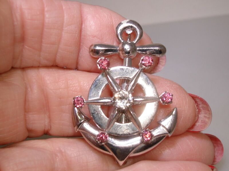 Vintage sterling silver nautical anchor pin with spinning rhinestone ship's wheel