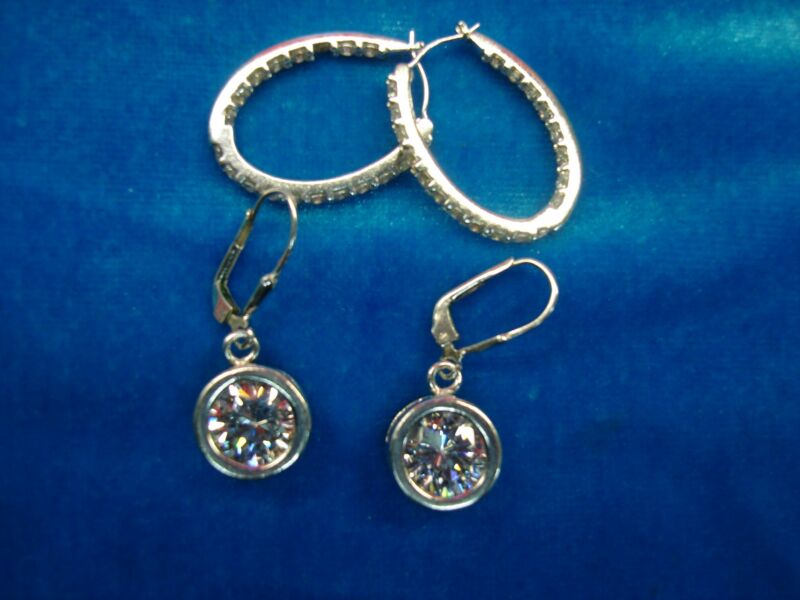 Sterling silver earrings, two pairs - dangle and snap-back designs with sparkling cubic zirconia accents.
