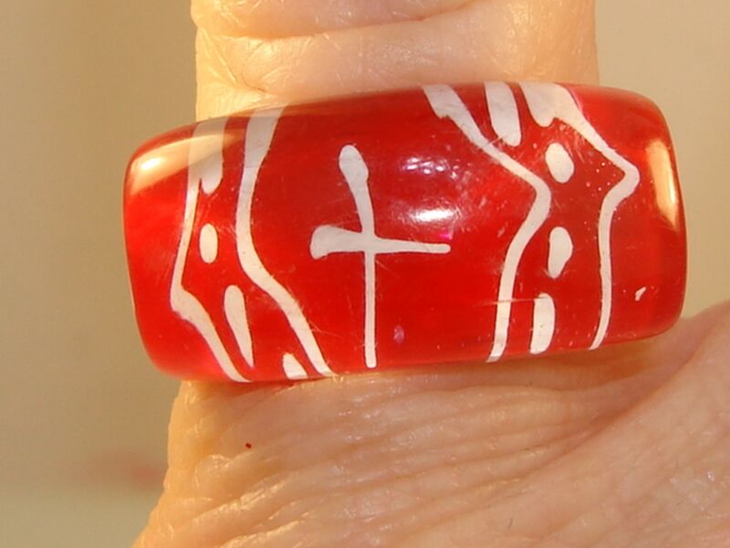 Vintage red lucite ring with a reverse-carved design, size 6 1/2