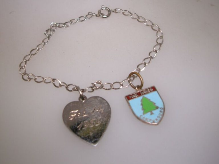 Vintage sterling silver charm bracelet with Pine Haven Campground and heart love charms, dated 1969