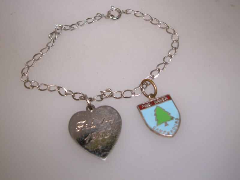 Vintage sterling silver charm bracelet with Pine Haven Campground and heart love charms, dated 1969
