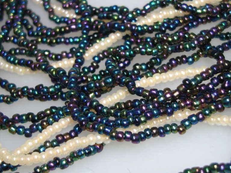 Five antique Art Deco pearl seed bead strands in iridescent blue/green and white, 34 inches each