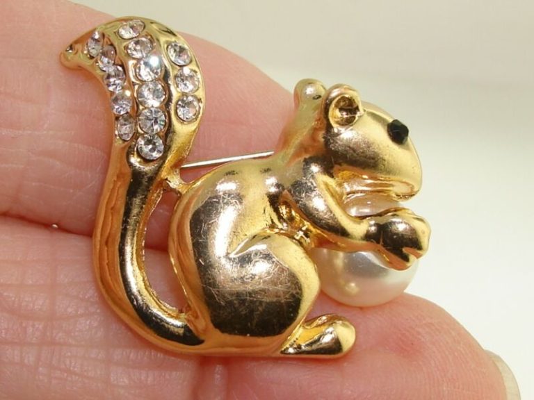 Vintage gold-plated squirrel pin with rhinestone tail and faux pearl accent, 1960s jewelry