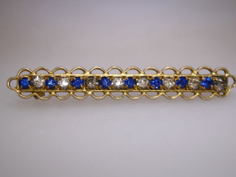 Vintage 1920s gold-washed filigree rhinestone bar pin with cobalt blue and clear rhinestones
