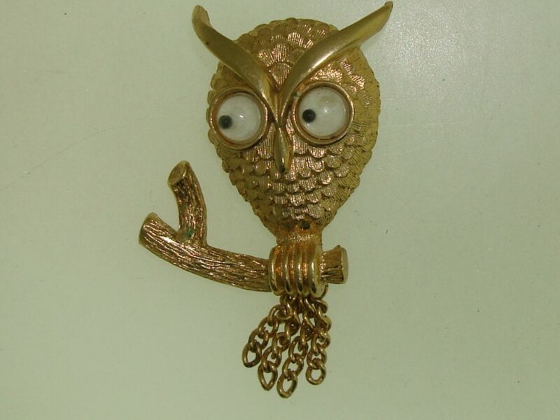 Vintage 1960s Avon gold-tone owl pin with tassel tails and wiggly eyes