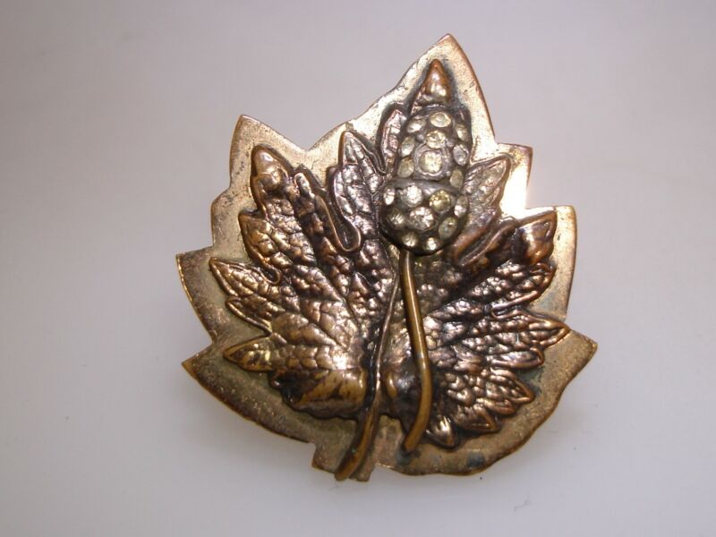 Antique copper oak leaf dress clip with rhinestone acorn