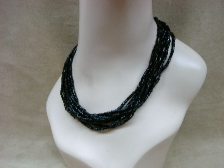Vintage black glass tube bead necklace with eight strands, bias cut for sparkle