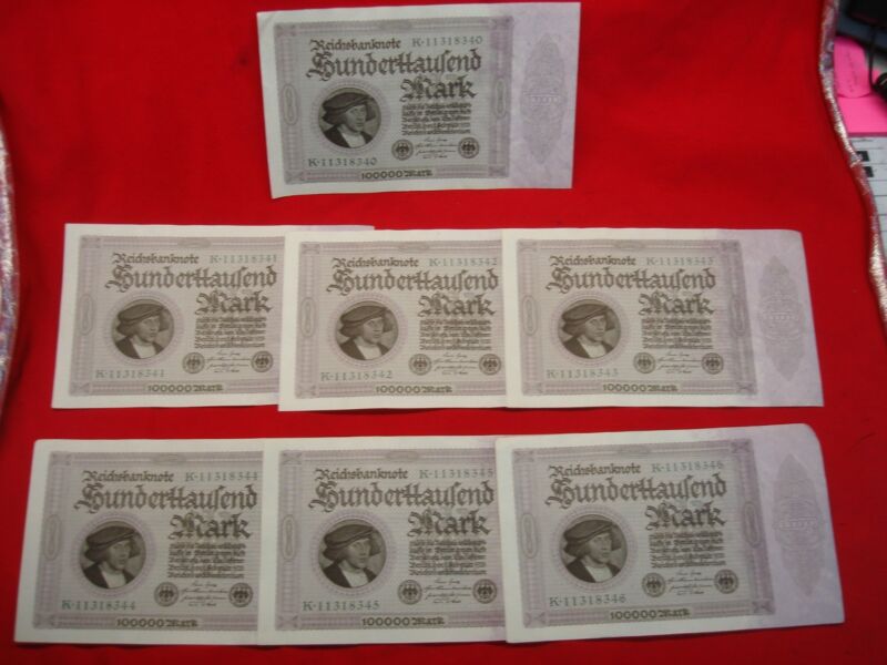 Set of seven consecutive 1923 Germany 100,000 Mark banknotes in AU condition