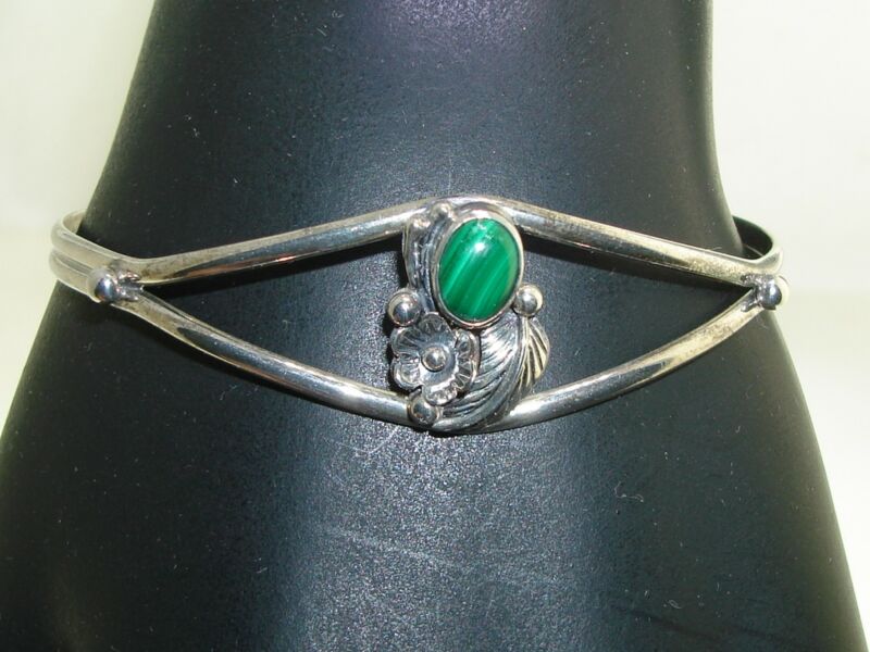 Vintage Native American sterling silver cuff bracelet with malachite and feather accents