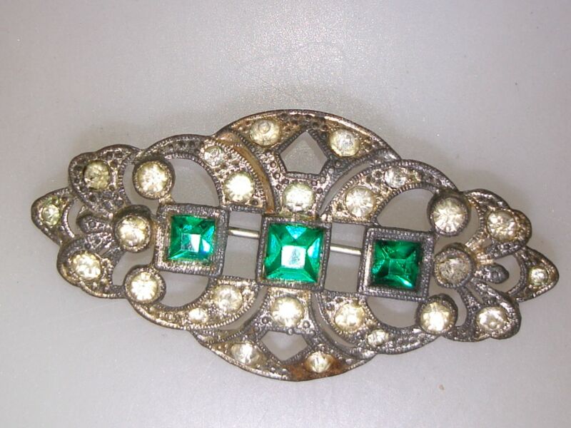 Art Deco rhinestone pin with green and clear filigree