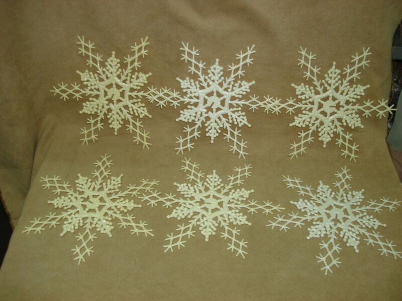 Set of six vintage Lucite snowflake ornaments