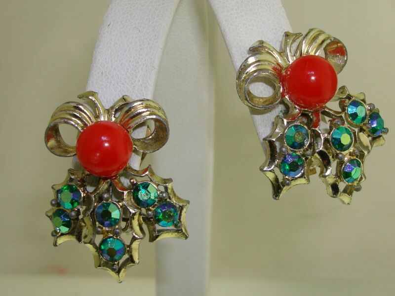 Vintage 1960s clip-on earrings with faux holly and blue AB rhinestones