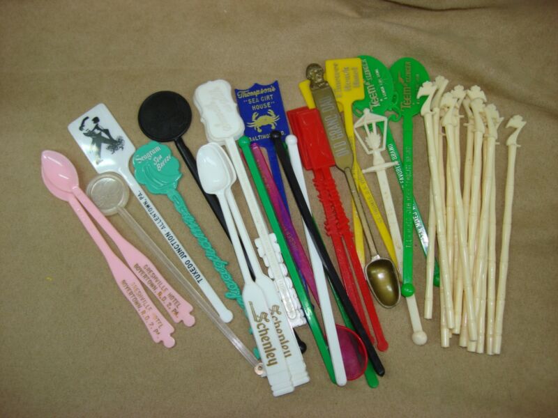Collection of 37 vintage swizzle sticks from various bars and hotels, including Seagrams, Old Grandad, and more.