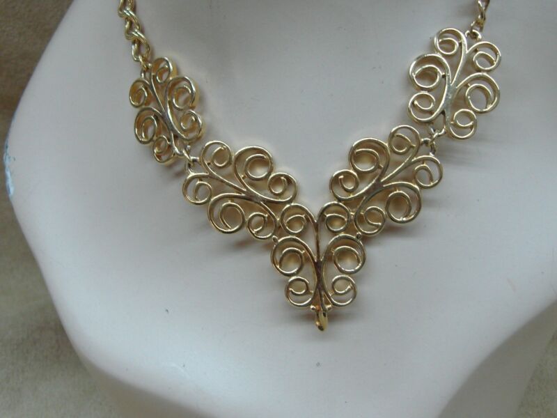 1980s gold tone swirl choker necklace