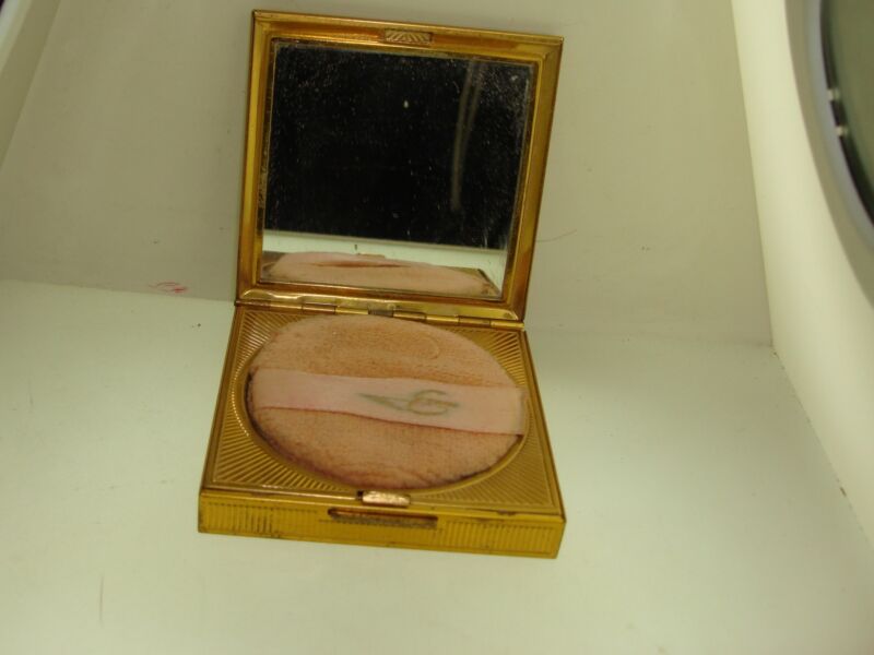 Vintage 1950s Elgin powder compact, gold-tone finish and geometric design