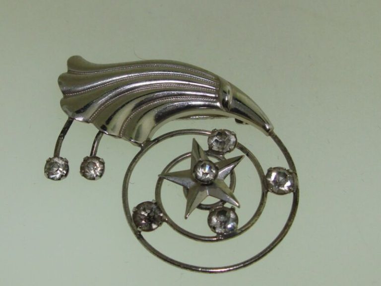 Vintage 1940s gold-filled shooting star pin with foiled rhinestones