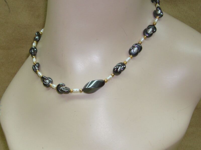 Vintage 1980s choker necklace with freshwater pearls, gold-tone accents, and hematite