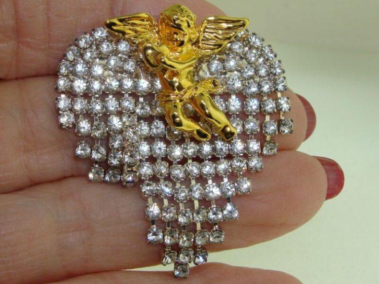 Vintage gold-tone angel brooch pin with sparkling rhinestone fringe