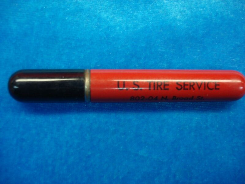 Vintage Redilite fluid lighter advertising U.S. Tire Service, featuring Philadelphia and Camden locations