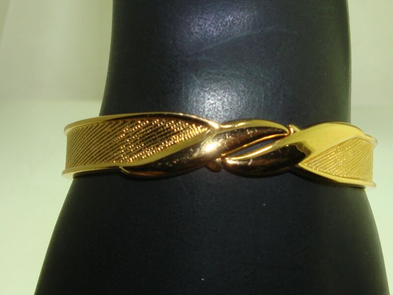 Vintage Monet gold-tone bangle bracelet, 1970s