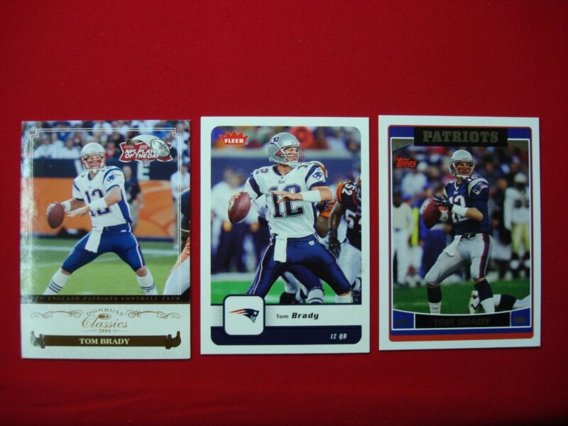 3-card lot of Tom Brady New England Patriots football cards from 2006