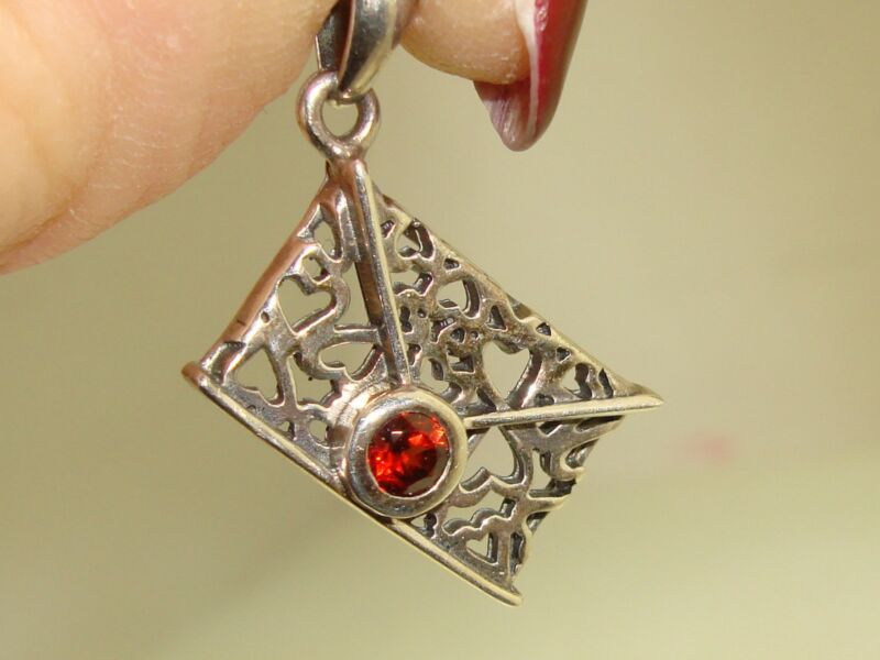 Sterling silver filigree heart charm with garnet