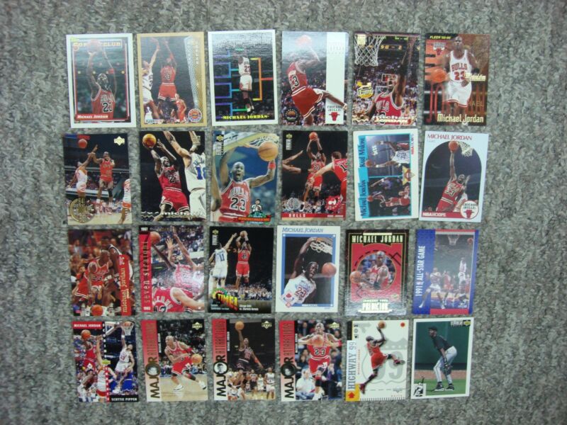 Vintage Michael Jordan card lot featuring 23 Chicago Bulls basketball cards and 1 Birmingham Barons baseball card.