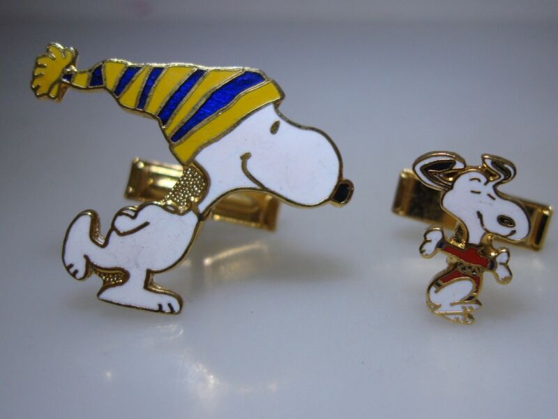 Vintage 1960s Snoopy cufflinks featuring Happy Dance and stocking cap designs