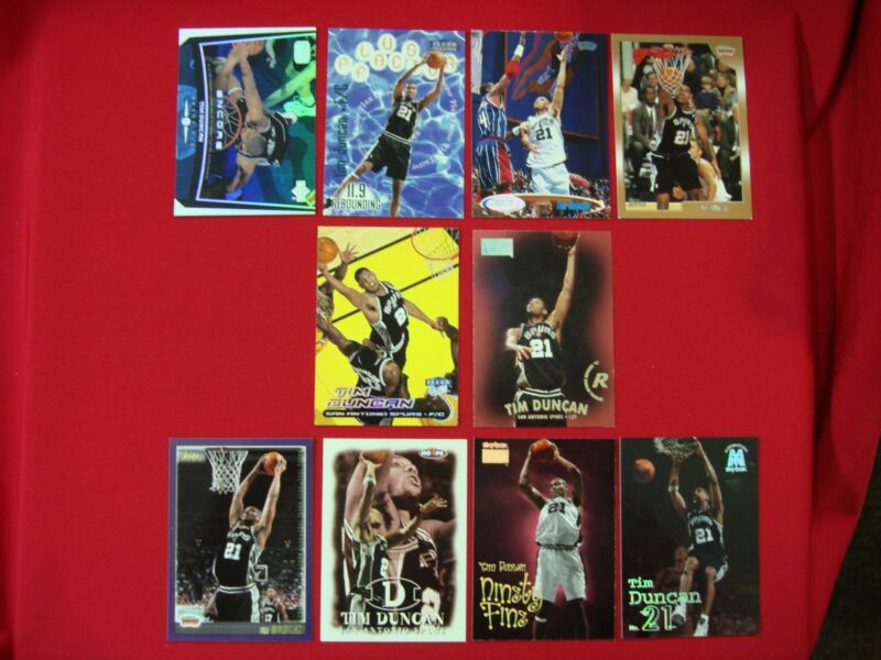 Collection of 10 Tim Duncan basketball cards, including premium and Encore parallels.