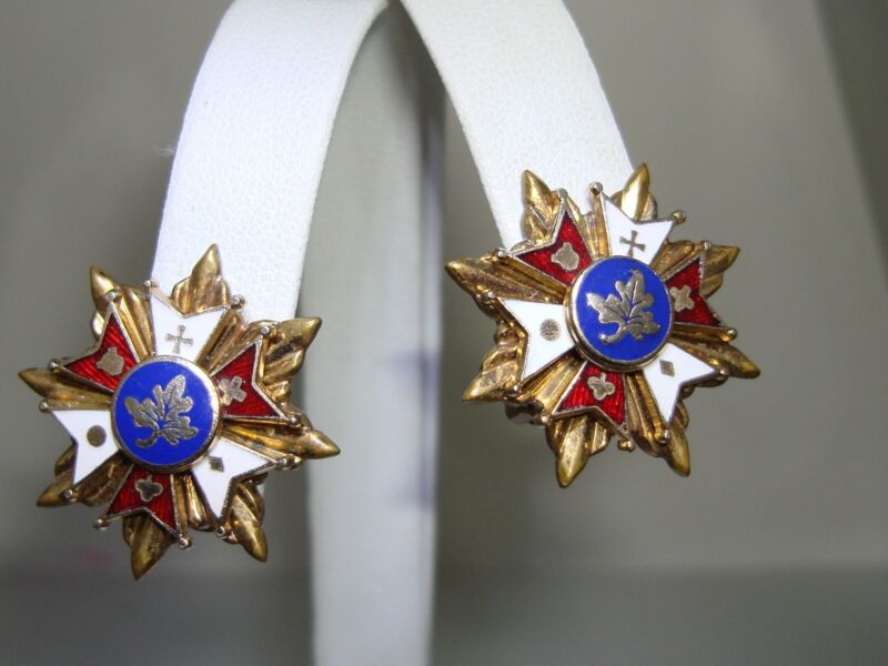 Vintage gold-washed enamel oak leaf shield earrings with red, white, and blue enamel accents.