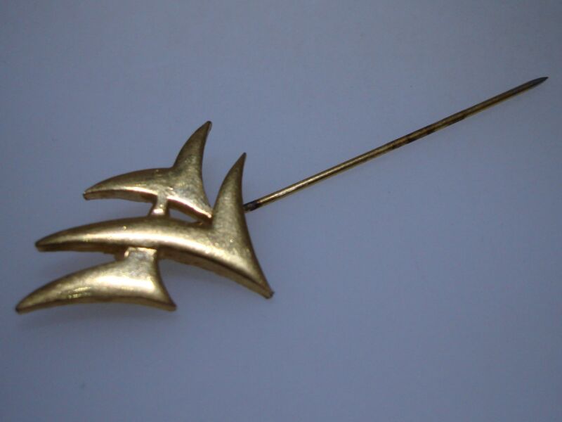 Vintage Trifari gold tone stick pin with crown design, 1960s