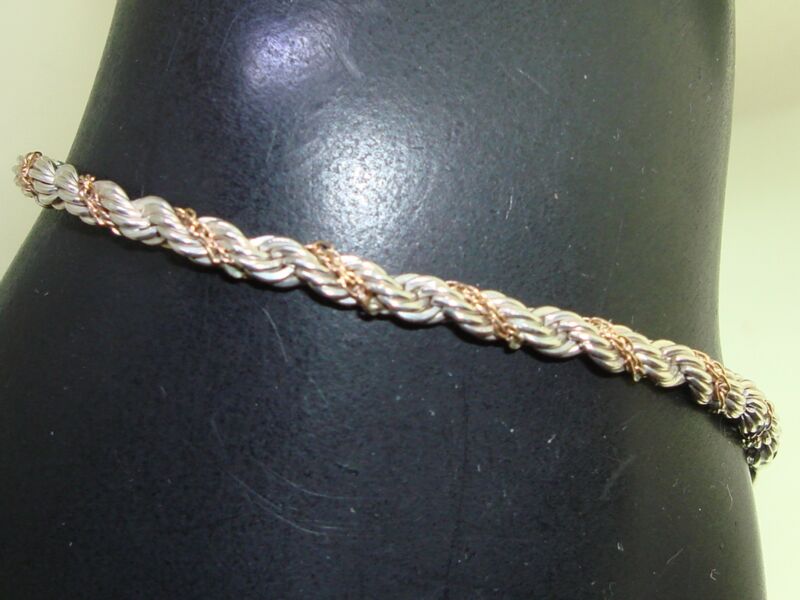 Vintage sterling silver and 14k gold rope bracelet signed 'W.R.E.'