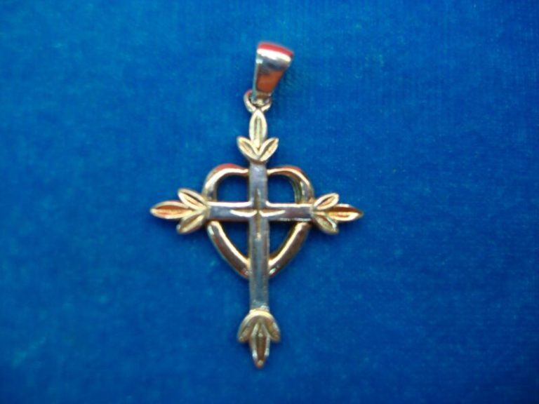 Gold accented sterling silver cross and heart pendant