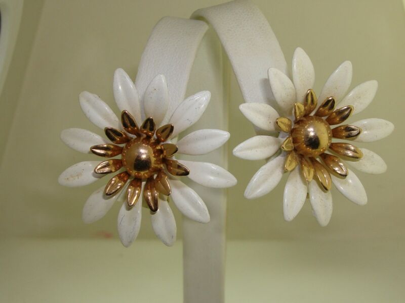 Vintage 1960s Sarah Coventry clip-on earrings with white enamel flowers
