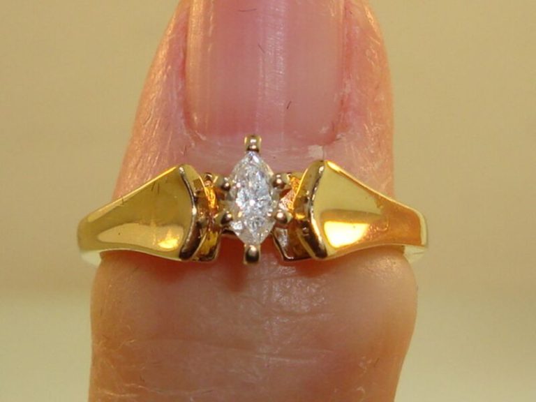 14K gold solitaire diamond ring, size 4.5