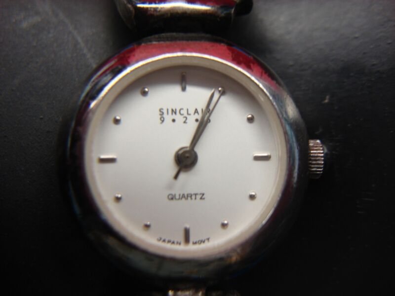 Vintage Sinclair 9.2.5 quartz watch with stainless steel case and cat bracelet