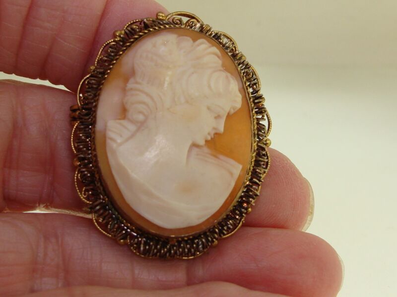 Antique Art Nouveau cameo pin featuring a patriotic lady with stars & stripes, gold washed