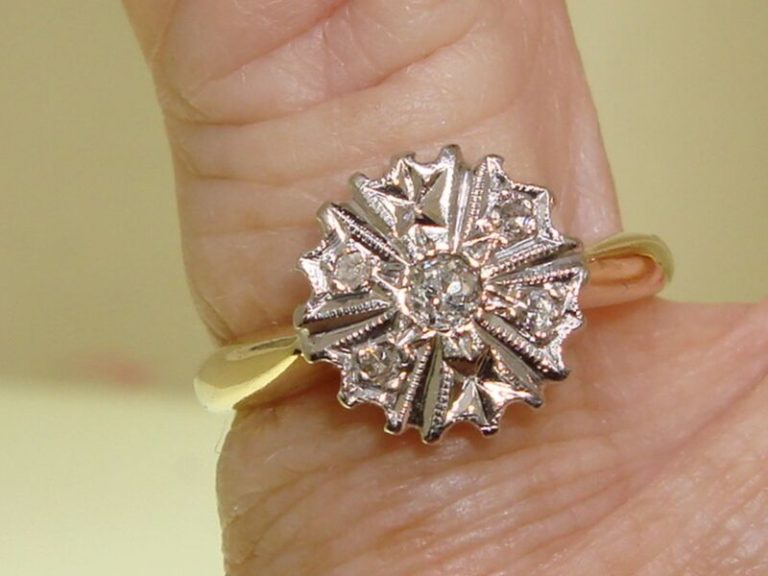 Vintage 14K gold starburst diamond ring, size 5, 1/5 carat total weight.