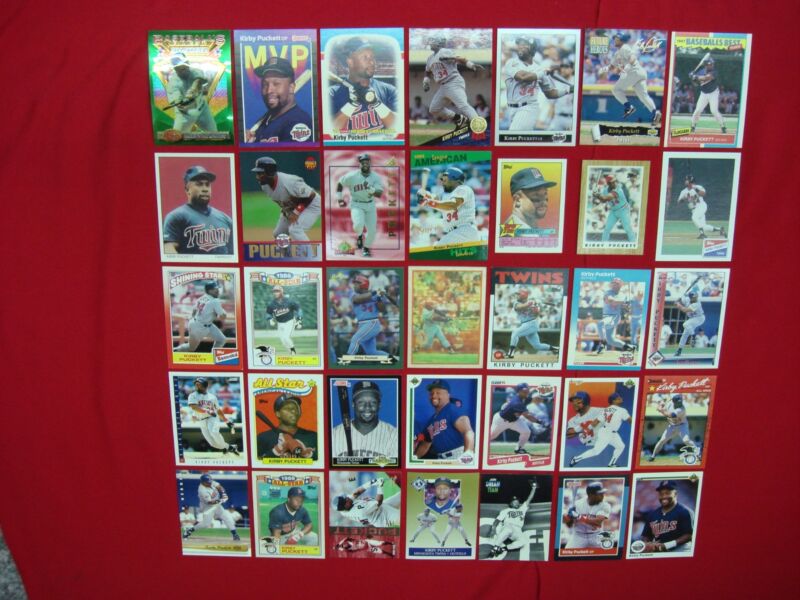 Collection of 35 Kirby Puckett baseball cards, including premium, early edition, sample, inserts, and rare oddities