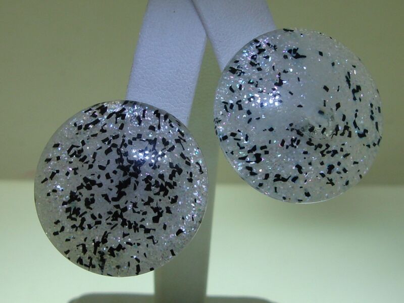 Vintage 1950s clip-on earrings with iridescent lucite confetti dome design