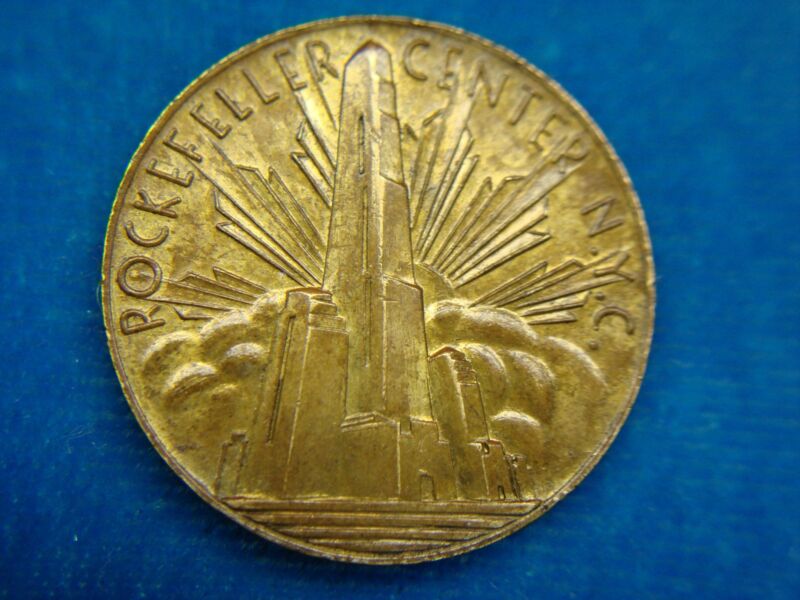 Vintage brass token commemorating Rockefeller Center, New York City