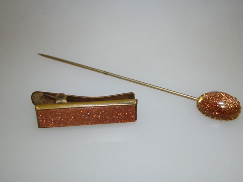 Antique gold-tone stick pin and tie clip set from the 1920s-30s