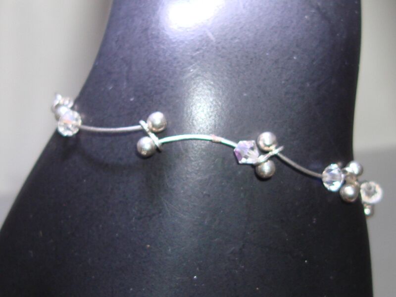 Sterling silver aurora borealis bracelet with curved link design