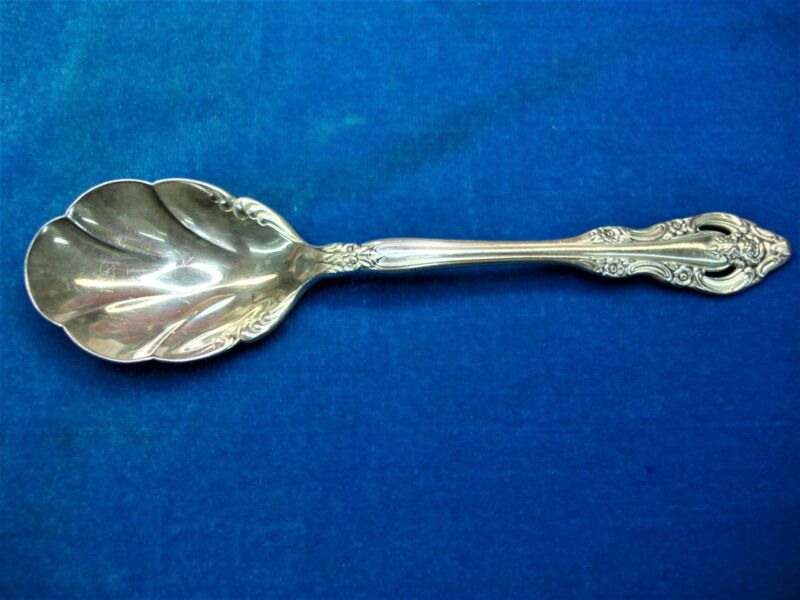 Vintage silver plate sugar spoon with the Community Silver Artistry pattern