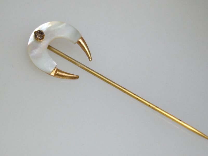Antique gold tone mother of pearl bull horn stick pin