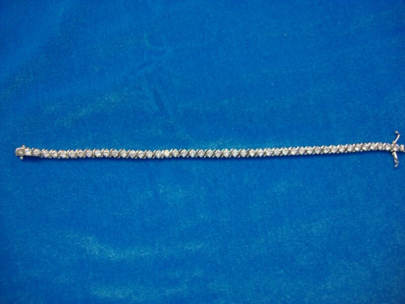 Sterling silver bracelet with sparkling round stones, pre-owned, excellent condition