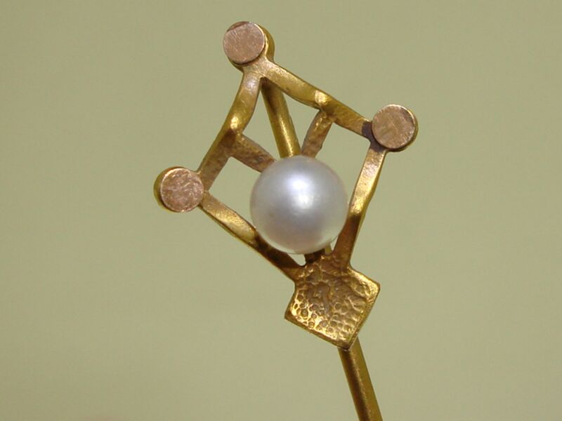 Antique gold filled stick pin with a creamy white freshwater pearl